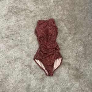 Black and brown polka dotted swimsuit